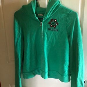 Green cropped zip up sweater